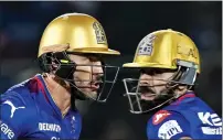  ?? — AFP ?? Royal Challenger­s Bengaluru captain Faf du Plessis (left) and Virat Kohli run between the wickets during the IPL match against Rajasthan Royals.