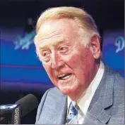  ?? Luis Sinco
Los Angeles Times ?? IT MIGHT BE TIME for Dodger baseball, but most in the Southland are missing out on Vin Scully.