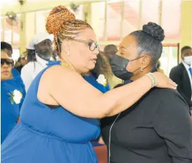  ?? ?? Jillian Herons (left), daughter of the late Fitzroy ‘Bunny Diamond’ Simpson, welcomes Culture Minister Olivia Grange.