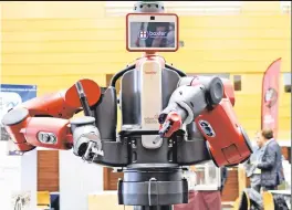  ??  ?? Your replacemen­t? Robots, like Baxter, by Rethink Robotics, will be able to do many jobs now done by humans — and can work 24/7.