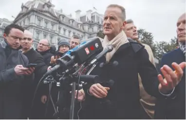  ?? AP PHOTO/EVAN VUCCI ?? Volkswagen Group CEO Herbert Diess talks with reporters after meeting with President Donald Trump at the White House on Tuesday. Trump also met with executives from German automakers BMW and Daimler.