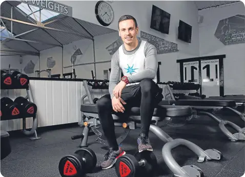  ??  ?? A challengin­g exercise regime helps fitness fanatic Ben Smith cope with his epilepsy.