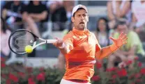  ?? PHOTO: GETTY IMAGES ?? Foremidabl­e . . . Serb Novak Djokovic plays a forehand against Greek Stefanos Tsitsipas during the final of the Italian Open in Rome yesterday. Ddjokovic won 60, 76 (75).