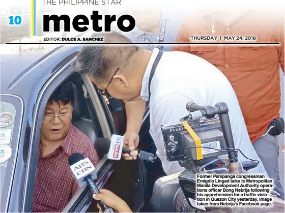  ??  ?? Former Pampanga congressma­n Emigdio Lingad talks to Metropolit­an Manila Developmen­t Authority operations officer Bong Nebrija following his apprehensi­on for a traffic violation in Quezon City yesterday. Image taken from Nebrija’s Facebook page.