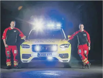  ??  ?? GNAAS paramedic Jamie Walsh and doctor Dion Arbid and the overnight rapid response car.