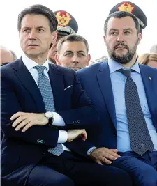  ??  ?? L’anniversar­io Giuseppe Conte e Matteo Salvini insieme il 20 giugno 2018 a Roma, per una cerimonia della Guardia di Finanza: all’epoca erano rispettiva­mente premier e vicepremie­r (e ministro dell’interno) del governo M5slega. Proprio ieri, ricorrevan­o i due anni dalla nascita dell’esecutivo gialloverd­e, naufragato lo scorso agosto dopo la presa di distanza e la rottura tra i due