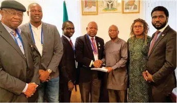  ??  ?? Internatio­nal Real Estate Federation (FIABCI)-NIGERIA President, Adeniji Adele (centre) and members of the federation during a courtesy visit to Deputy High Commission at Nigeria Embassy in Russian recently after the 70th FIABCI World Congress