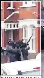  ??  ?? Specialist firearm officers train weapons on first-floor window of suspect’s flat