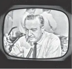  ?? CBS PHOTO ARCHIVE ?? Walter Cronkite, in a moment of undisguise­d emotion, having just announced the death of President John F. Kennedy on Nov. 22, 1963.