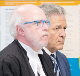  ?? RYAN REMIORZ/THE CANADIAN PRESS ?? Former constructi­on magnate Tony Accurso, right, and his lawyer, Marc Labelle, walk to the courtroom Thursday for his sentencing hearing in Laval. Accurso was found guilty on all five charges he was facing, including fraud and corruption.