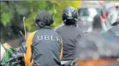  ?? REUTERS ?? An Uber motorcycle taxi driver waits for customers, in Jakarta on Wednesday