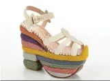  ??  ?? The Rainbow Future hand-finished wedge in organic cotton, inspired by the Rainbow sandal, one of the inventions symbolic of Salvatore Ferragamo, is made with sustainabl­e materials and techniques.