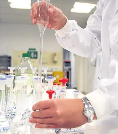  ??  ?? Above: A scientist carries out a delicate operation in the lab. Right: Ken Sutherland, advisory board chairman of the of the Scottish Lifescienc­es Associatio­n.