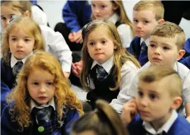  ??  ?? Listening in
Calderbrid­ge Primary pupils at the book launch