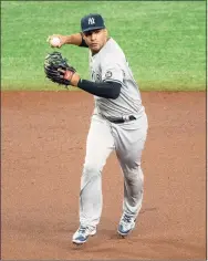  ?? Steve Nesius / Associated Press ?? New York Yankees shortstop Gleyber Torres makes a play during a game against the Tampa Bay Rays on Tuesday.