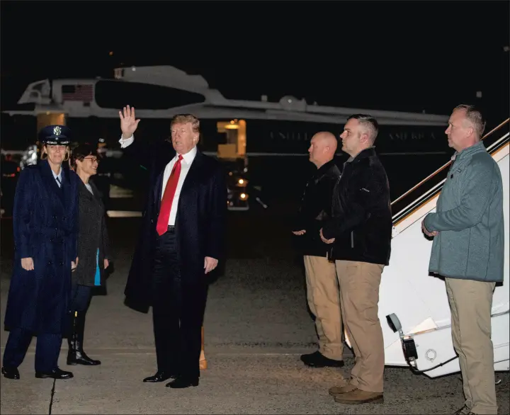  ?? ANDREW HARNIK/AP ?? President Donald Trump arrives at Andrews Air Force Base in Maryland on Thursday after traveling to Iraq and Germany.