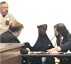  ?? — Reuters photo ?? Defence attorney Aleksandar Kostich (right) speaks to defendant Lucas Morton in district court where Morton and five others accused of child abuse were granted bail in Taos County, New Mexico, US.