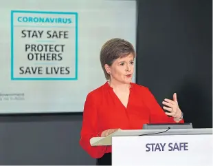  ??  ?? Nicola Sturgeon said Covid-19 quarantine checking would begin shortly.