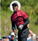  ?? AP ?? Tiger Woods watches his tee shot on the fifth hole during the final round at the Masters in April.