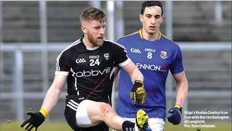  ??  ?? Sligo’s Keelan Cawley in action with Darren Gallagher of Longford.
Pic: Tom Callanan.