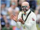  ?? /Hagen Hopkins /Getty Images) ?? Well pleased: Nathan Lyon of Australia celebrates the wicket of Rachin Ravindra of New Zealand on day four of the first of two Tests.