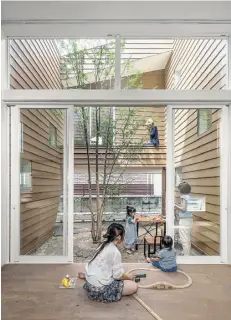  ??  ?? Even a single tree gives life to a courtyard in a house designed by Keiko Maita Architect Office in Shunan, Japan.