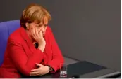  ?? — AFP ?? German Chancellor Angela Merkel during a session at the Bundestag lower house in Berlin on Tuesday.