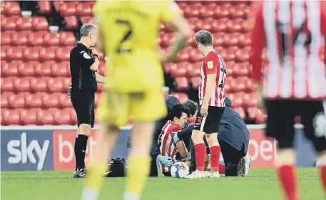  ??  ?? Luke O’Nien suffered what Sunderland fear could be a serious injury on Tuesday night