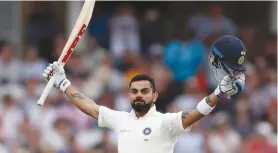  ?? (Paul Childs/Reuters) ?? INDIA’S VIRAT KOHLI celebrates a century in an August test vs England at Nottingham’s Trent Bridge.