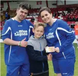  ??  ?? Paddy McCarrick’s children, Thomas and Lisa, with Jayden Reynolds, penalty shoot-out winner.