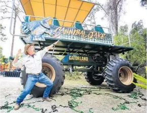  ?? JACOB LANGSTON/STAFF ?? Mark McHugh, Gatorland’s president and CEO, shows off one of the attraction’s new swamp buggies. The park announced its new off-road adventure, Stompin’ Gator Off-Road Adventure, in April.