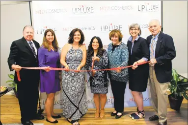  ?? Contribute­d Photo ?? Mizzi Cosmetics in Portland held a grand opening on June 13. From left: Middlesex County Chamber of Commerce Chairman Jay Polke, state Rep. Christie Carpino, Mizzi Cosmetics Vice President of Sales and Customer Service Rebecca Sardinskas, Mizzi...