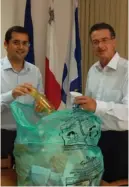  ??  ?? Gzira mayor Roberto Cristiano and GreenPak Coop CEO, Ing. Mario Schembri, launching the waste recycling partnershi­p agreement