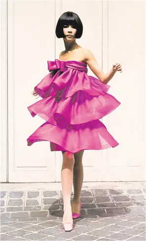  ??  ?? Hot pink: Hiroko Matsumoto in a cocktail dress in Pierre Cardin,
among the top titles for fashion fans this Christmas