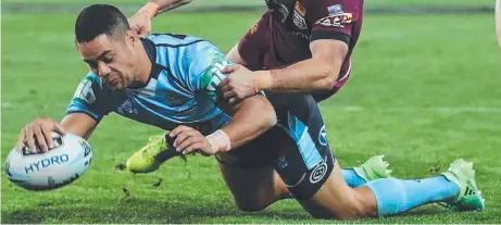  ??  ?? TOUCH DOWN: Jarryd Hayne scores a try during last night’s Game Two.