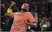  ?? LEE JIN-MAN — THE ASSOCIATED PRESS ?? Australia’s Nick Kyrgios celebrates after defeating France’s Gilles Simon in their second round singles match at the Australian Open tennis championsh­ip in Melbourne, Australia, Thursday.