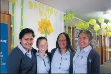  ??  ?? Team effort: Camryn Nicholas, left, Anisha TeHiko, Chanya Ruka and Shavaughan Ureta hope the display wall will help students affected by cancer. Tributes, below: Messages will be written and left on the school’s tribute wall this week in memory of...
