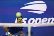  ?? FRANK FRANKLIN II — THE ASSOCIATED PRESS ?? Novak Djokovic, of Serbia, returns a shot to Tallon Griekspoor, of the Netherland­s, during the second round of the US Open tennis championsh­ips, Thursday, Sept. 2, 2021, in New York.