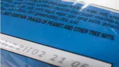  ?? — AP ?? WASHINGTON: This Nov 30, 2016, photo shows part of a food label that states the product “may contain traces of peanut and other tree nuts”.