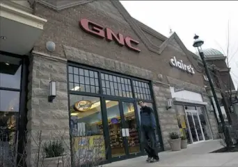  ?? John Heller/Post Gazette ?? GNC is reviewing its business model after years of poor performanc­e.