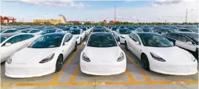  ?? Photo: Xinhua ?? Tesla’s Gigafactor­y 3 plant in Shanghai can produce about 2,000 electric vehicles a day.