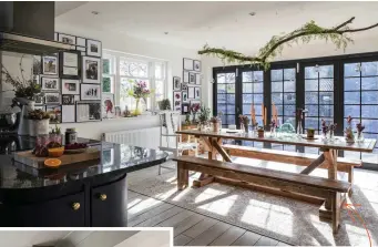  ??  ?? ADD GREENERY WITH FORAGED FOLIAGE Kirsty has added colour to the big space by bringing the outside in. ‘I scavenged a branch from the forest next to my house and attached tealights to it,’ she says