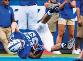  ?? AP PHOTOS ?? Air Force running back Timothy McVey scores a against Abilene Christian during the game at Falcon Stadium in Colorado Springs, Colo., Saturday.