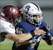  ?? NWA Democrat-Gazette/CHARLIE KAIJO ?? Bentonvill­e West High School’s Tanner Anderson (right) runs the ball Friday at Wolverine Stadium at Bentonvill­e West High School in Centerton.