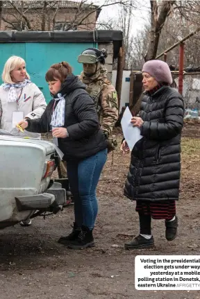  ?? AFP/GETTY ?? Voting in the presidenti­al election gets under way yesterday at a mobile polling station in Donetsk, eastern Ukraine