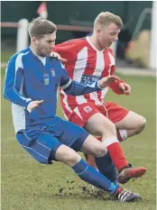  ??  ?? Seaham Red Star Reserves (red and white) battle against leaders Jarrow in last week’s 9-1 defeat. Pictures by Kevin Brady