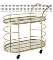  ?? ?? ROLLED GOLD Seraphina drinks trolley in gold, $249, earlysettl­er.com.au