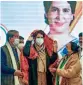  ?? ?? Congress general secretary Priyanka Gandhi Vadra with Uttarakhan­d Congress campaign committee chairman Harish Rawat and partys candidate from Mussoorie constituen­cy Godavari Thapli in Dehradun on Wednesday.