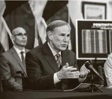  ?? Lynda M. Gonzalez / Dallas Morning News ?? Gov. Greg Abbott, shown at a Monday news conference, says Texans’ privacy will be respected under terms of the contract.