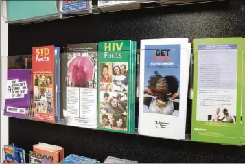  ?? NATRICE MILLER/AJC FILE ?? CDC data showed that metro Atlanta has the third-highest HIV rates in the nation. Educationa­l pamphlets about sexually transmitte­d diseases are available at the Empowermen­t Resource Center in downtown Atlanta.